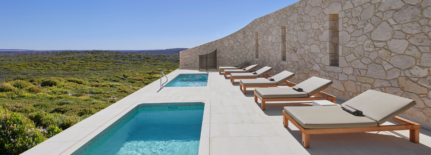 Sundrenched plunge pools provide a refreshing dip for guests lounging at Southern Ocean Lodge's Southern Spa. Kangaroo Island, Australia. 